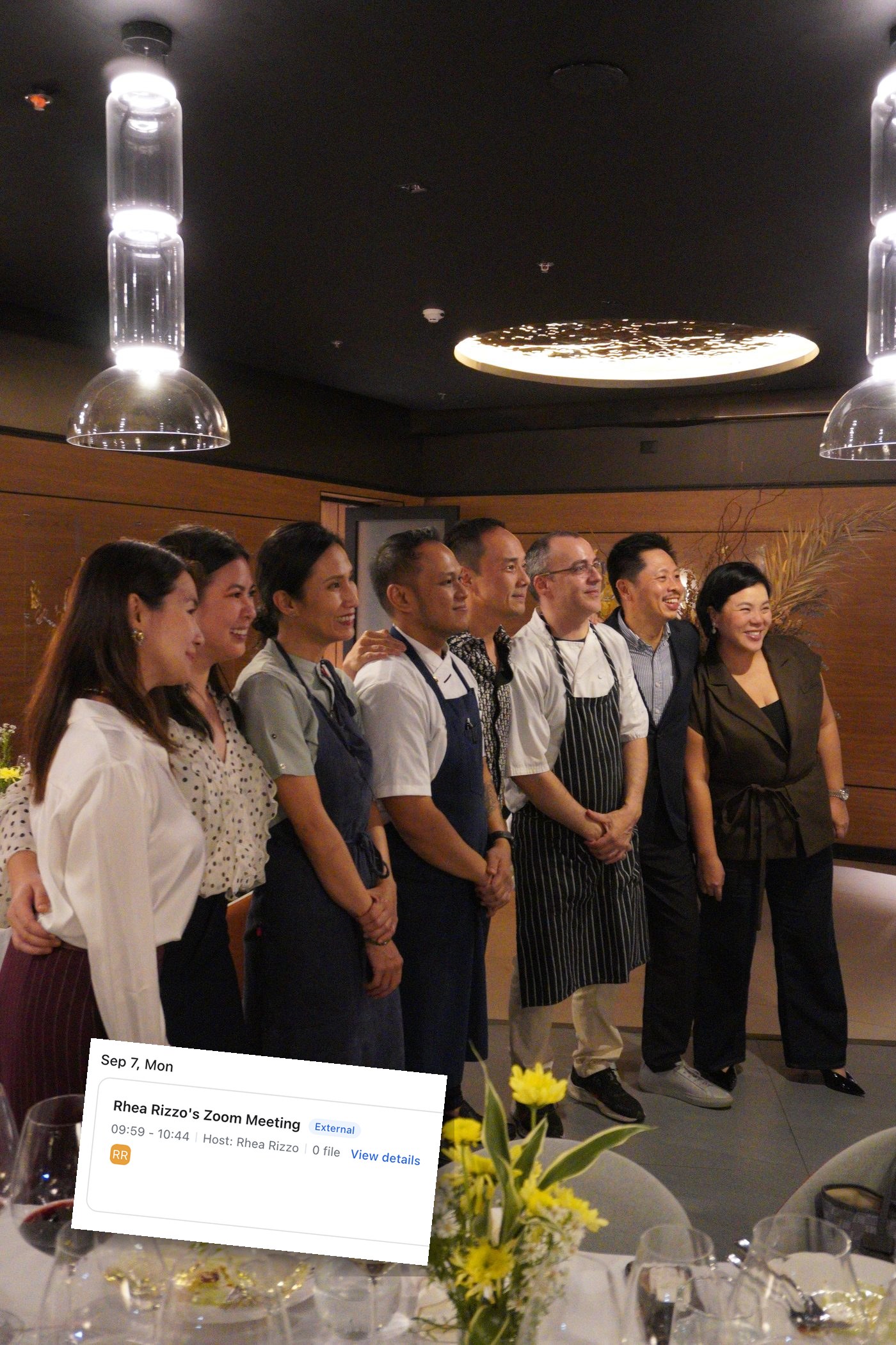 Chef Rhea Rizzo, Paulina, the Common Ground kitchen team, and guests lined up together at Dominion Cellar, with a screenshot of the calendar invite for the Zoom call five days later pinned over the bottom corner.