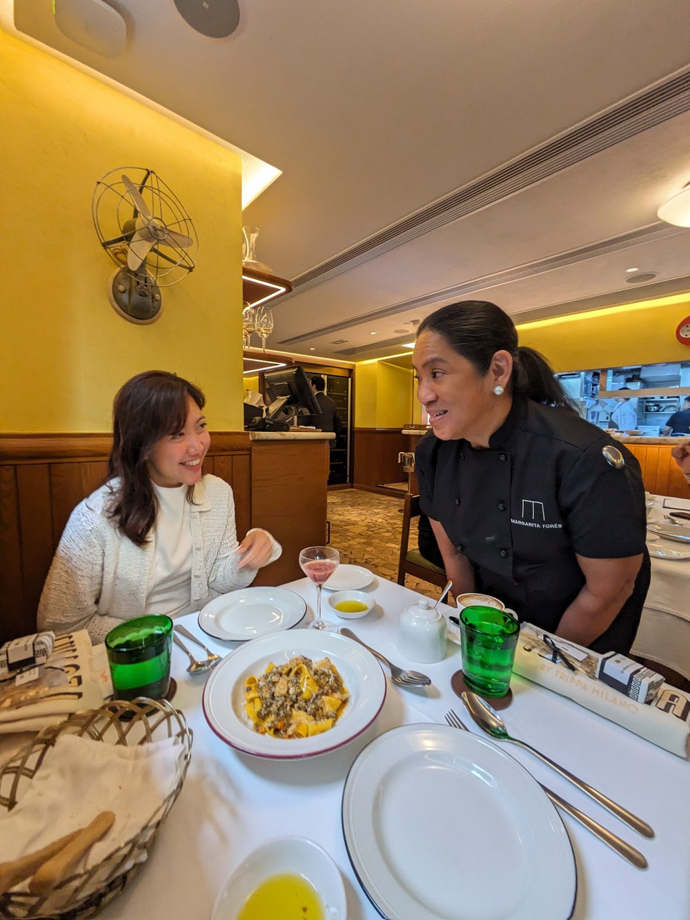 Paulina at the table with Chef Margarita Forés, Hong Kong.